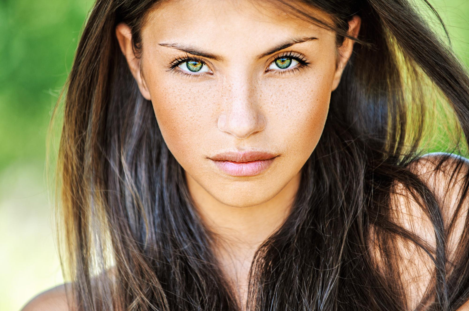 young beautiful woman with beauty green eyes